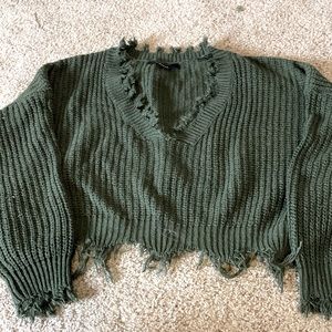 Green distressed sweater